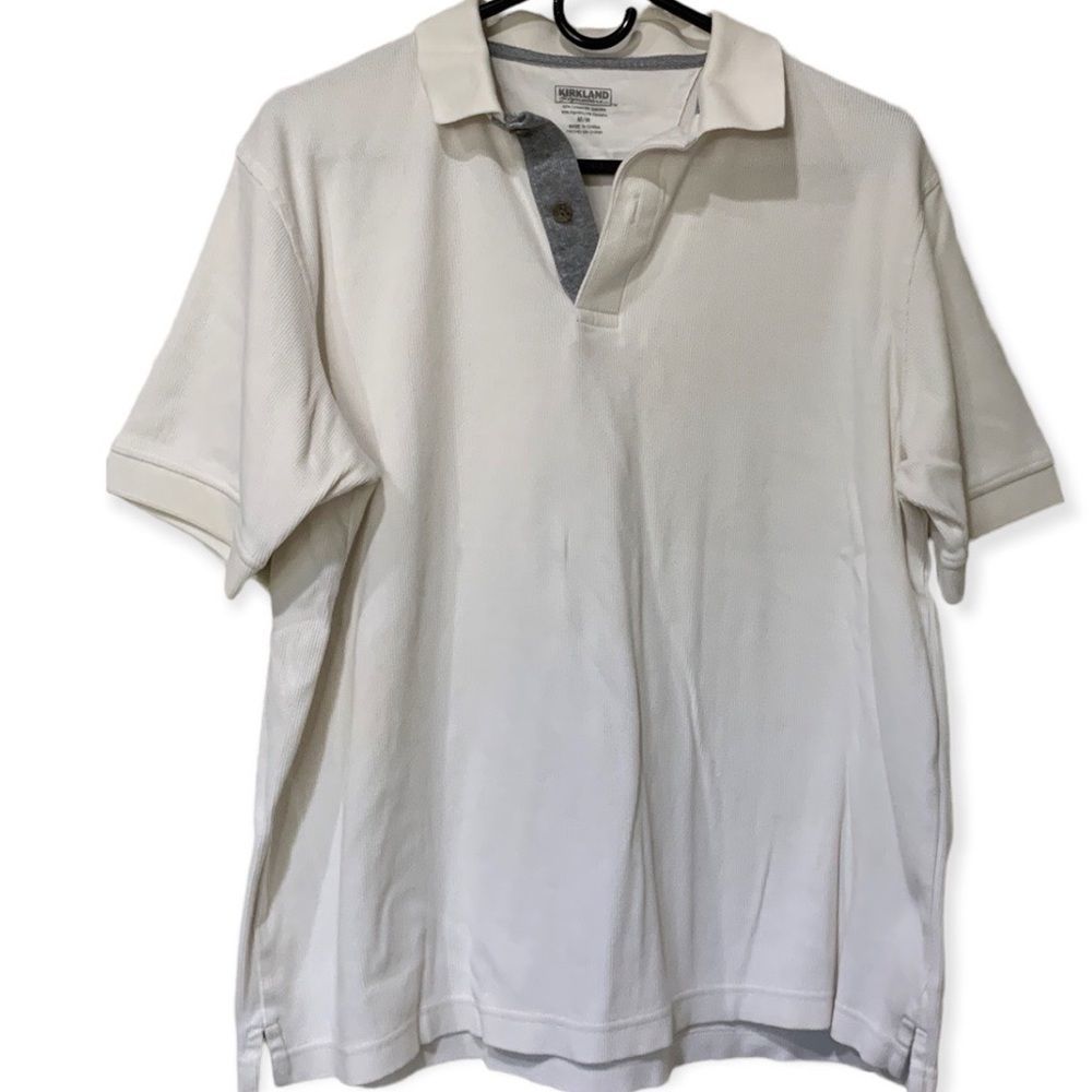 Kirkland ivory ribbed golf polo size medium with gray placket
